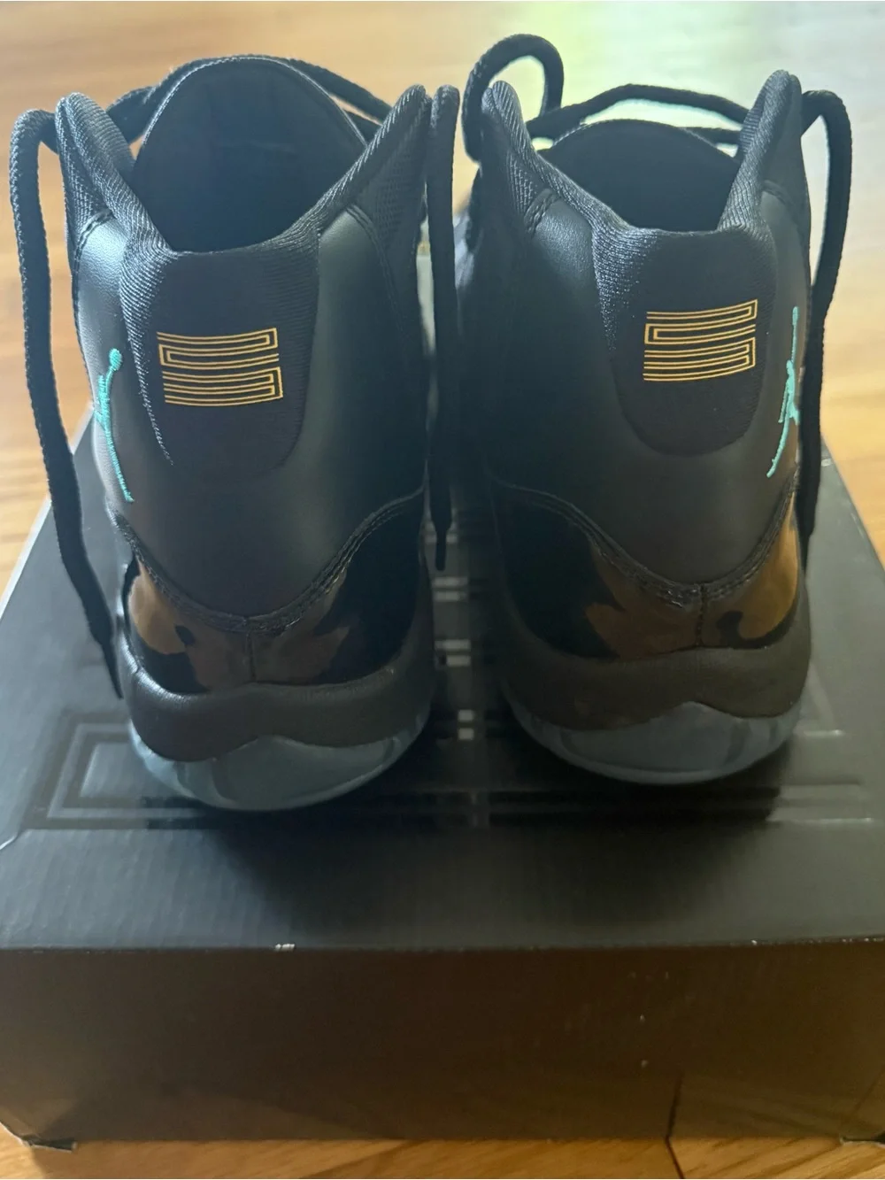 Jordan Retro 11 Athletic Shoes - Black with Teal Accents